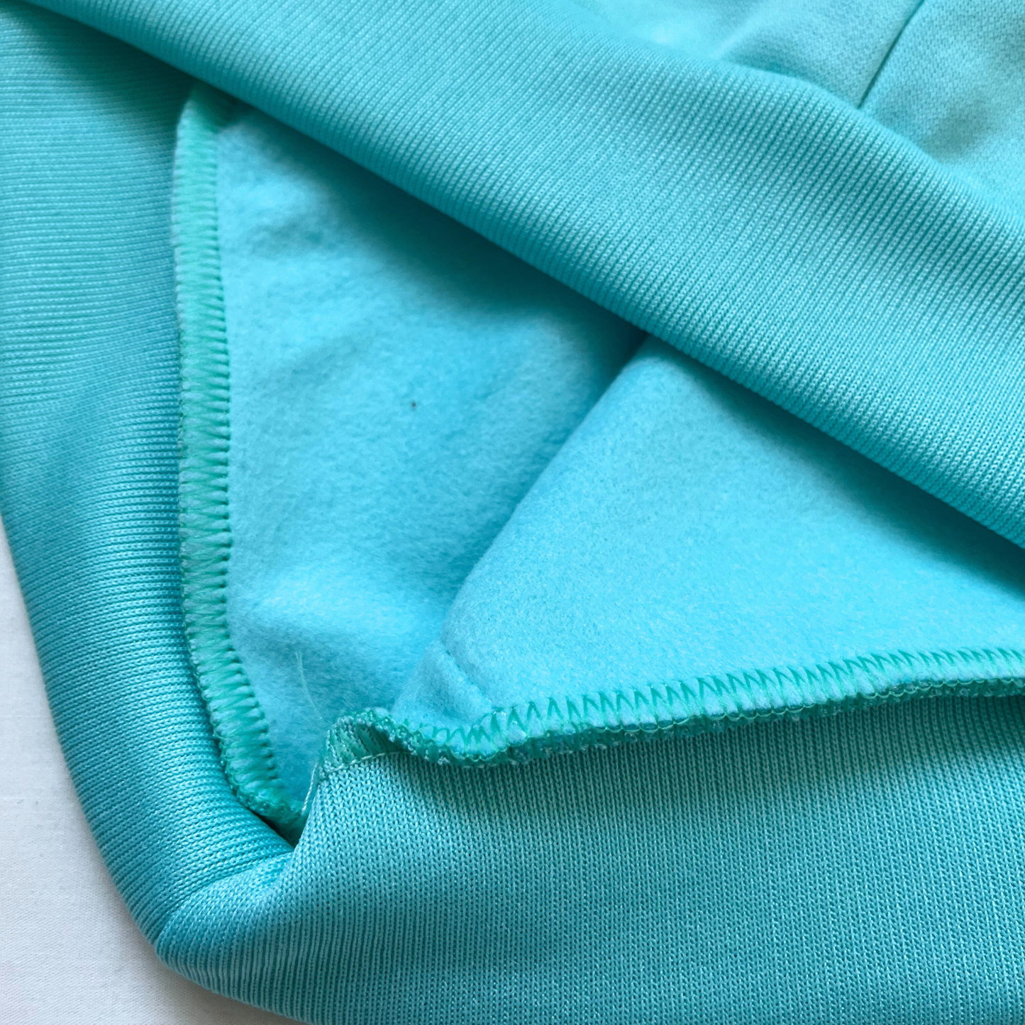 Buzo con capota - Aguamarina